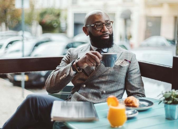 The Elm - Bethesda, MD - Person drinking coffee